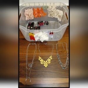 Large assortment of jewelry - mostly earrings and necklaces
